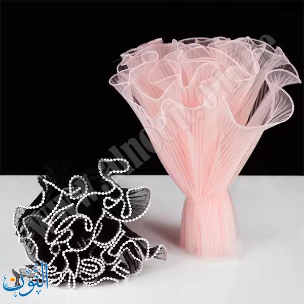 قماش تول مزخرف بحواف لؤلؤية