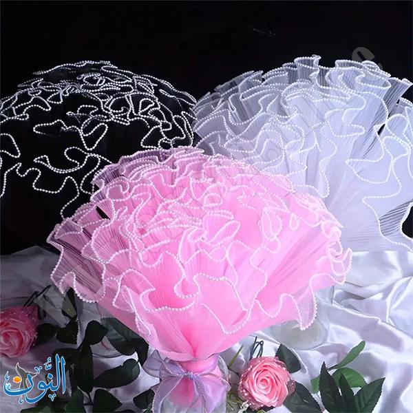 قماش تول مزخرف بحواف لؤلؤية